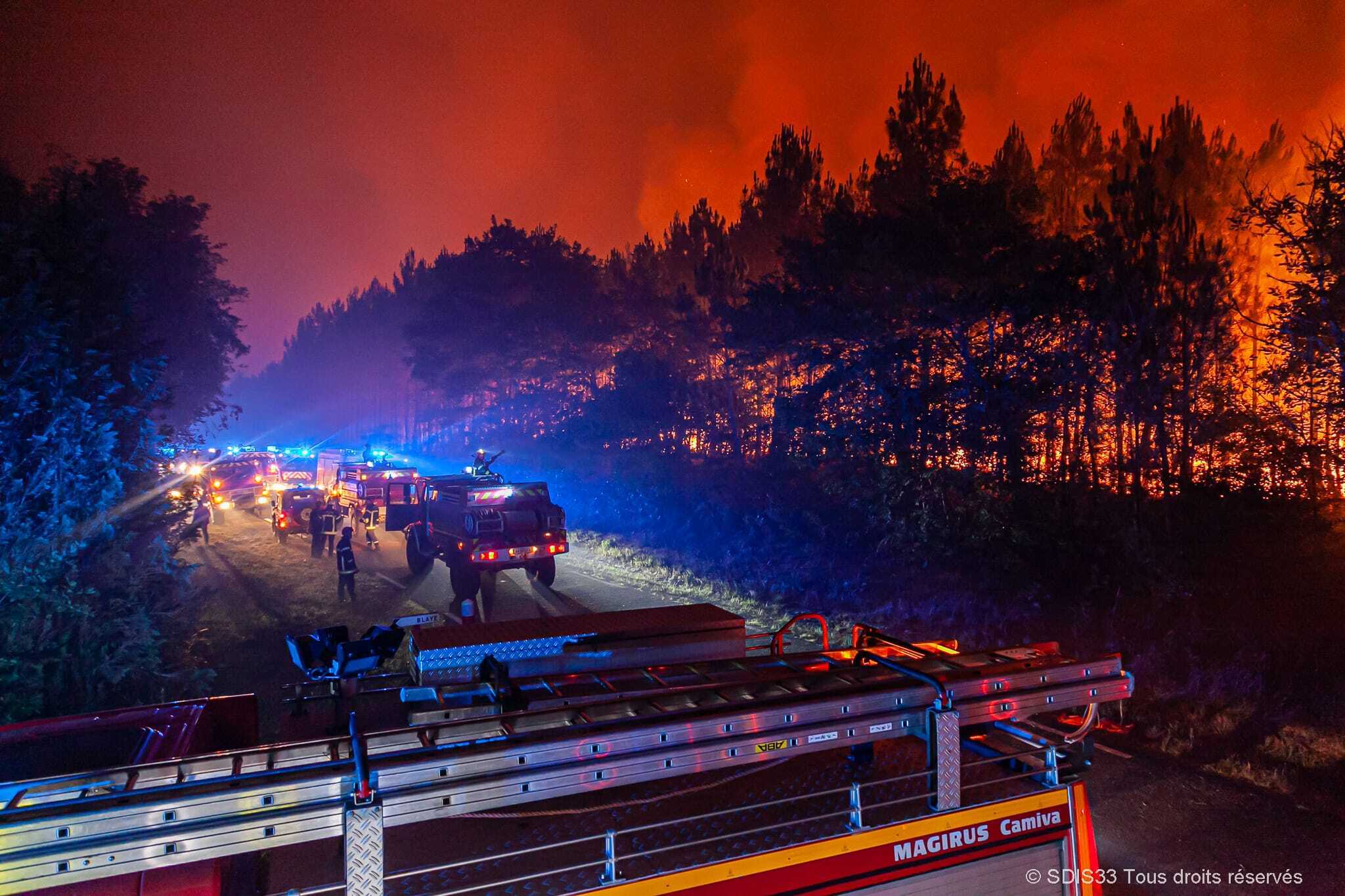 Firefighters fight a fire in south-western France