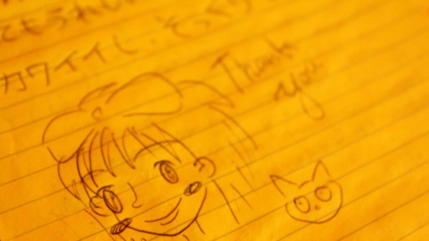 Small drawing showing Kiki and her cat Jiji in the guest book.