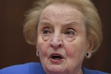 Former US Secretary of State Madeleine Albright speaks in a close up photo.