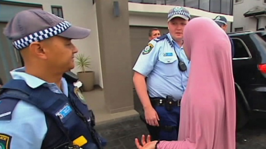 Woman at Merrylands home raided by police lashes out at media