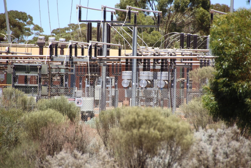 A power station near bushland.  