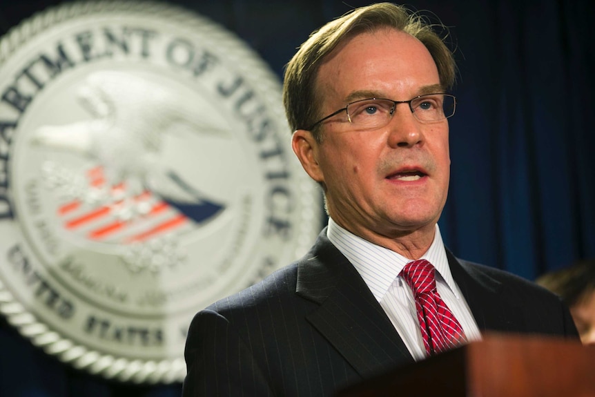 A head shot of Michigan attorney-general Bill Schuette making a speech.