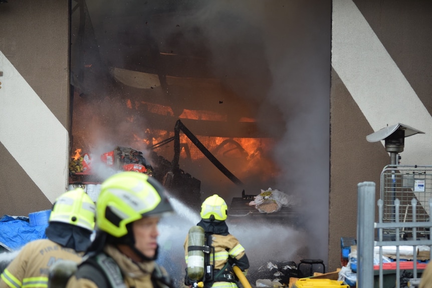 Firefighters at a large blaze.