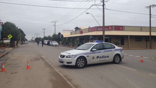 A police car outside the Bendigo bank at Virginia shopping centre in Adelaide.