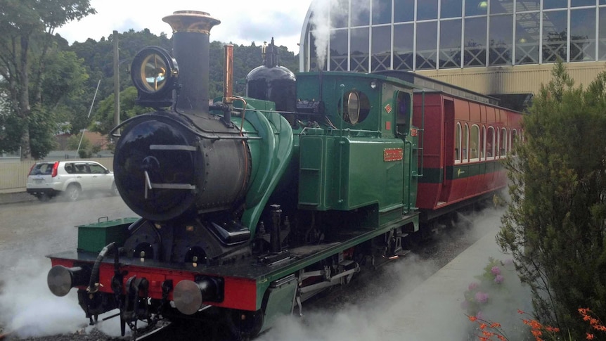 West Coast Wilderness Railway train leaves Strahan in Tasmania.