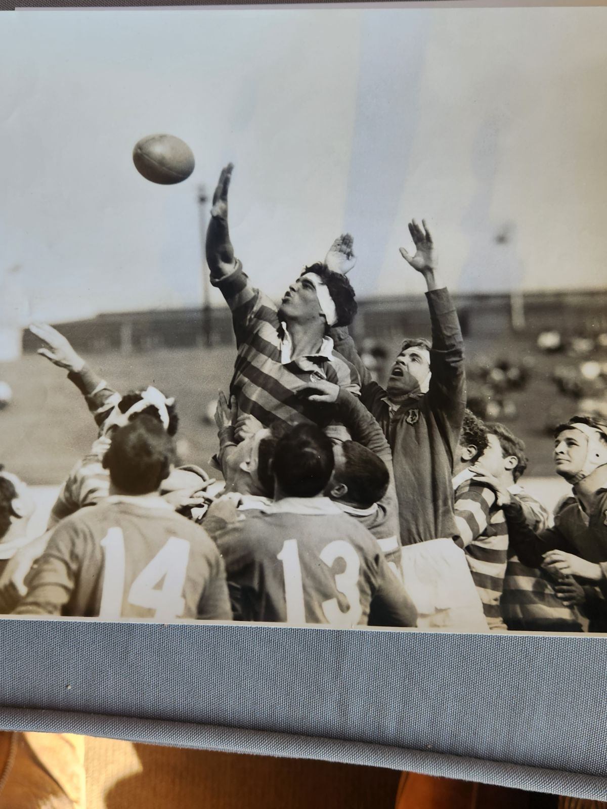 A group of men jumping for a ball
