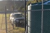 A large four wheel drive rams a fence on an oval