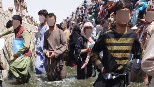 Ex-Australian guards and families in moat outside Kabul airport in Afghanistan