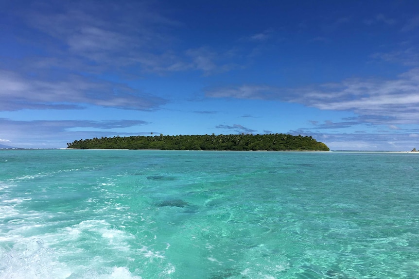 The island of Reiono in French Polynesia, as seen from a boat