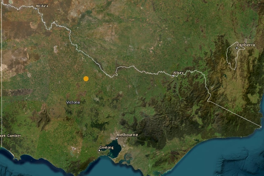 A map of the state of Victoria with a yellow dot marking where an earthquake was recorded
