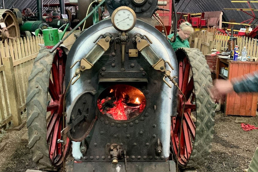A view into the hot coals in the engine of an old steam train.