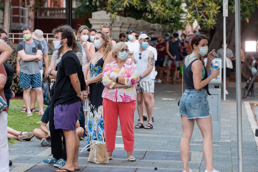 People wear face masks outside Royal Perth Hospital.