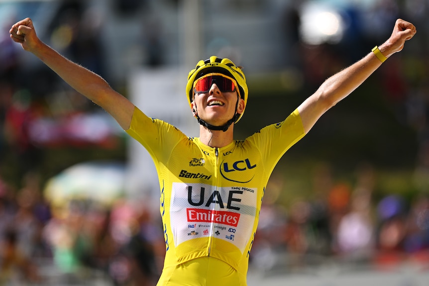 Tadej Pogacar celebrates at the Tour de France