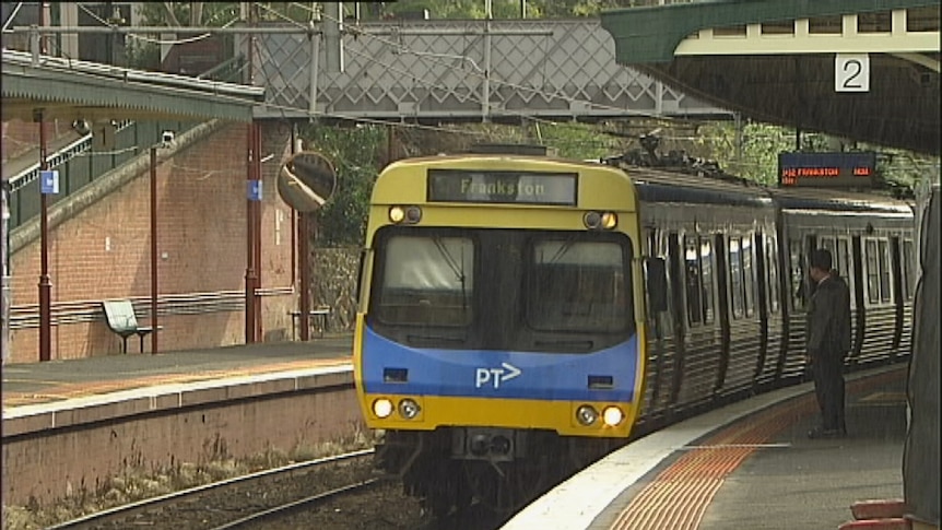 A Metro train approaches the platform at suburban station.