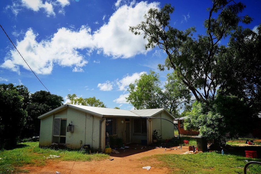 A house with a red dirt driveway in Katherine.