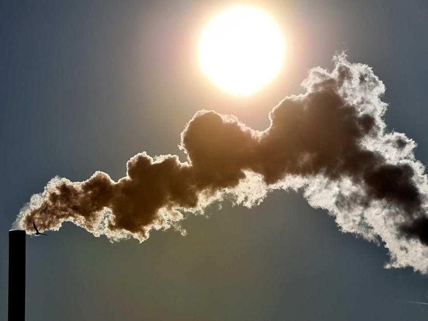 Smoke rises from chimney