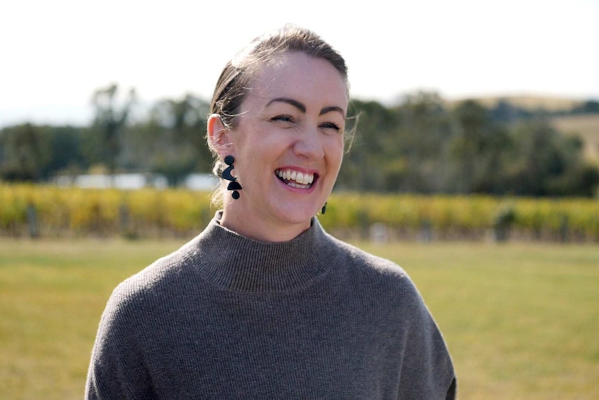 Image of a woman being interviewed at Hunter Valley vineyards
