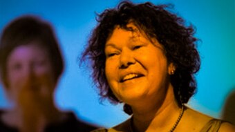 A woman looking to left of shot.