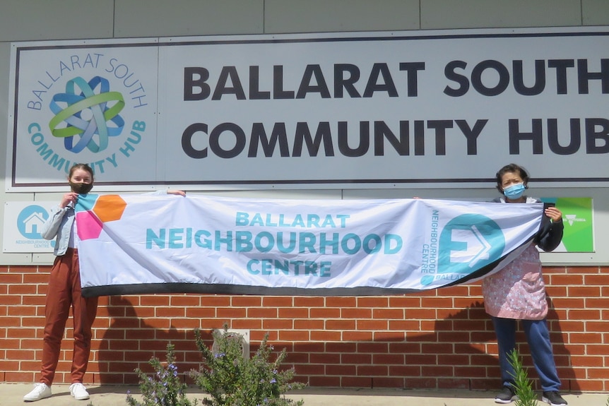 two people outside ballarat neighbourhood centre 