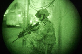 A US soldier seen through night vision