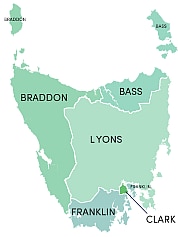 A map showing the state of Tasmania divided into five sections with labels saying Braddon, Bass, Lyons, Franklin and Clark.