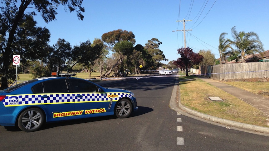 Police block off a street in Melton South after a toddler drowned in a backyard pool, September 14 2015.