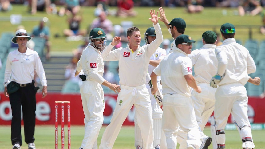 Premature celebrations... Michael Clarke thought he had the wicket of Faf du Plessis, but it was overturned on appeal.