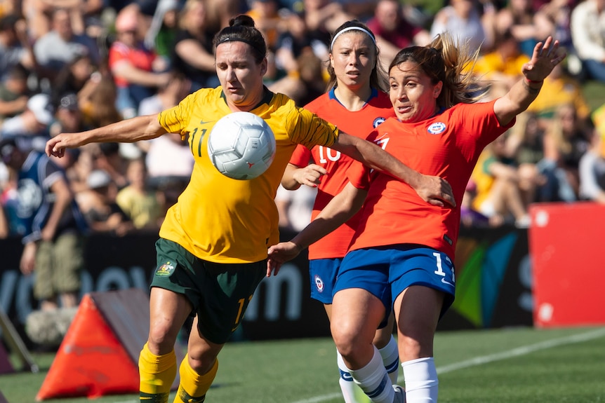 Lisa De Vanna and Geraldine Leyton contest the ball in the Australia versus Chile friendly.