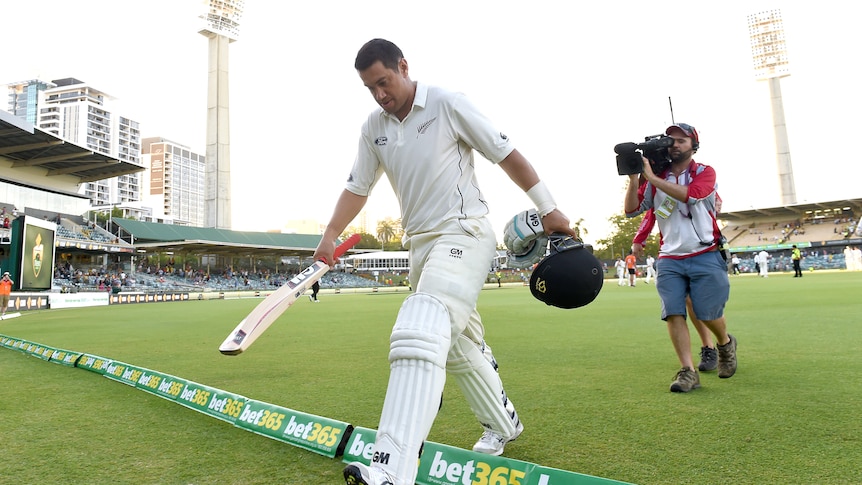 Ross Taylor walks off after double century