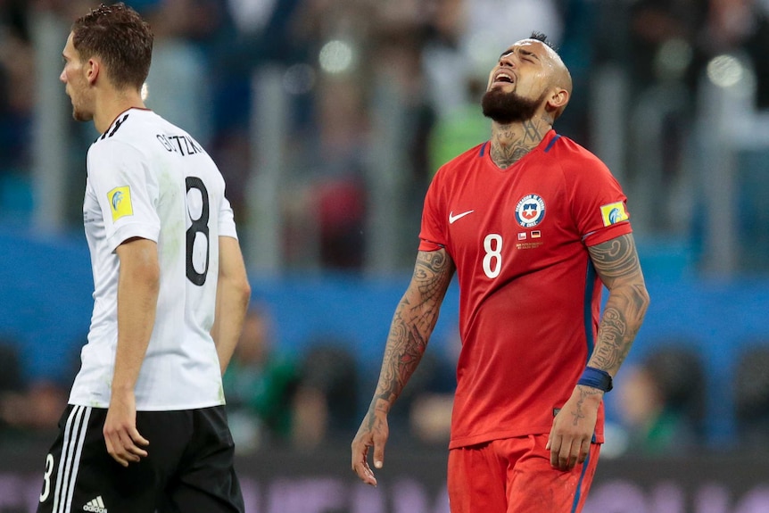 Arturo Vidal grimaces during Chile's Confederations Cup final loss to Germany