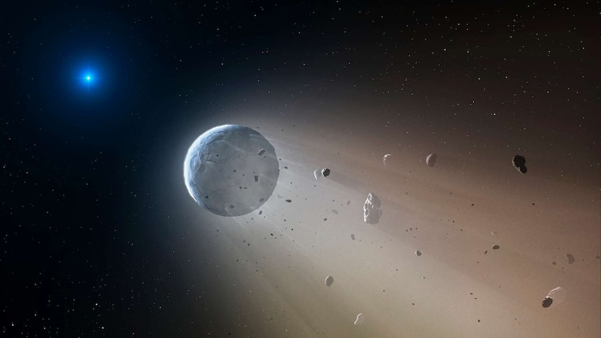 An artist's conception of a dwarf planet being slowly disintegrated as it orbits a white dwarf.