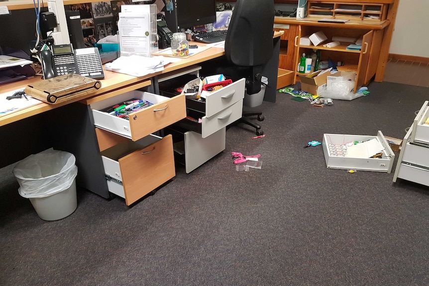 Desks pulled out and office contents strewn about at a primary school