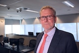 A portrait of Alan Macsporran, at the CCC's headquarters in Brisbane