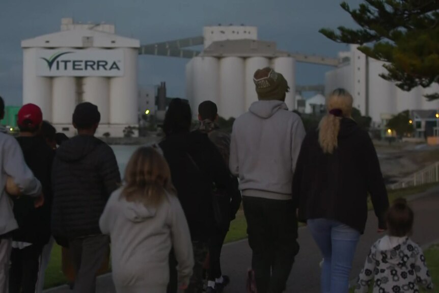 People walking in a vigil march