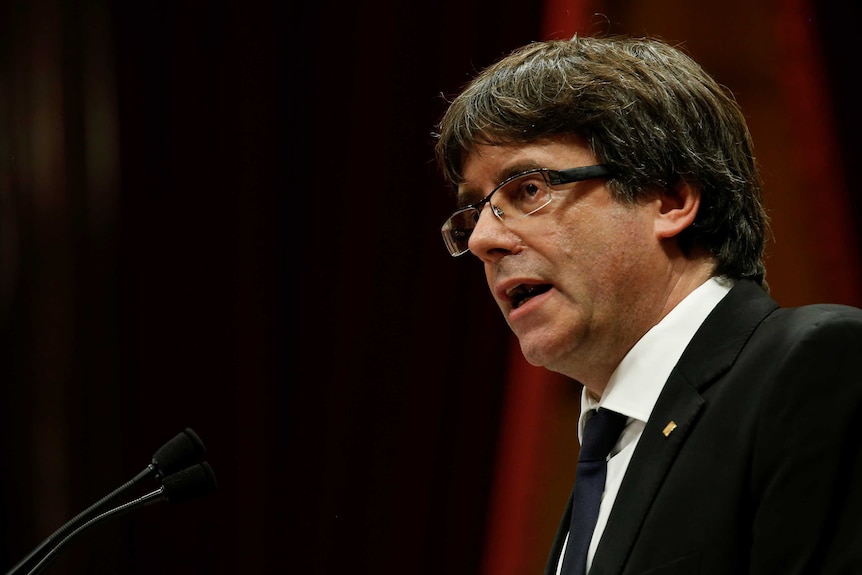 Catalan President Carles Puigdemont delivers a speech.