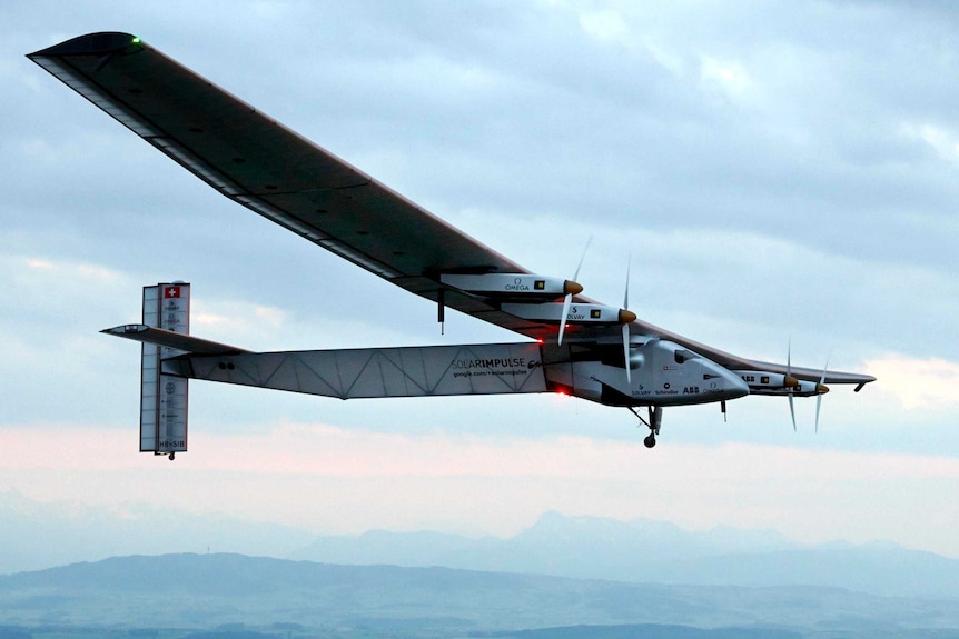 Solar Impulse 2 aircraft flies during its maiden flight.