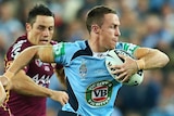 Maloney breaks past Maroons defence