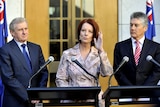Simon Crean (left), Stephen Smith (right) and Julia Gillard