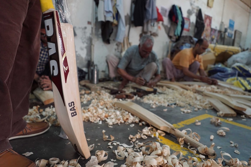 Close up of a cricket bat on the factory floor