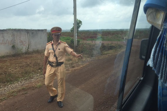 Vietnamese police block access to the memorial site at Long Tan