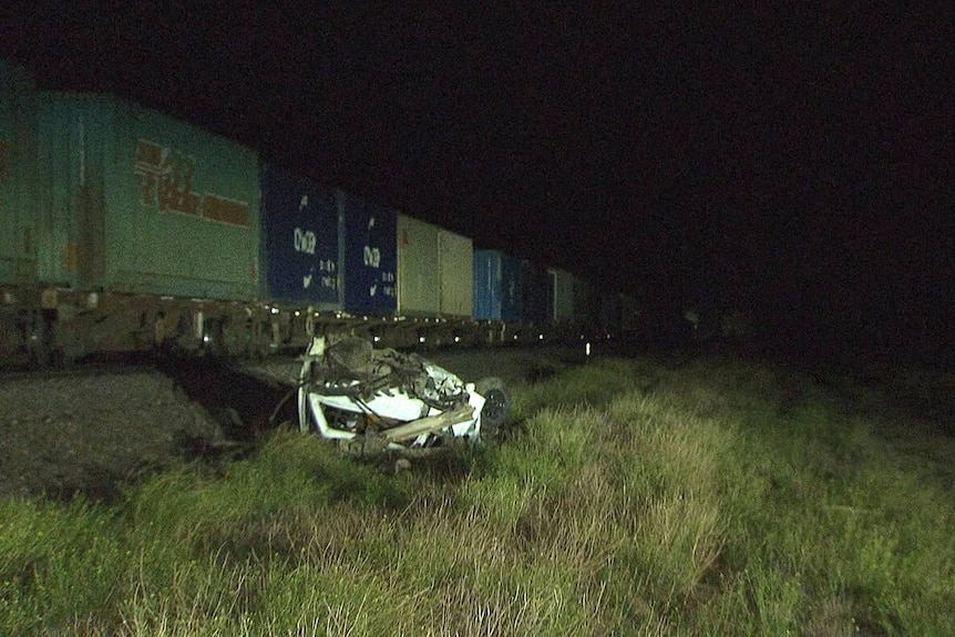 A wrecked Holden ute after it was hit by a freight train in Murray Bridge East.