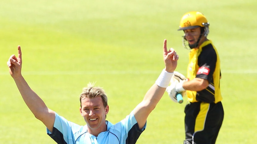 Successful return... Brett Lee celebrates the wicket of Luke Ronchi at Hurstville Oval