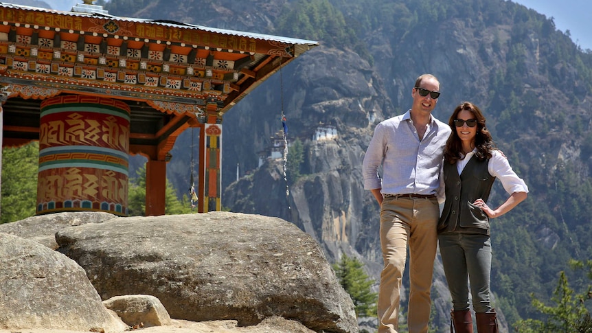 Prince William and Catherine pose on the mountainside.