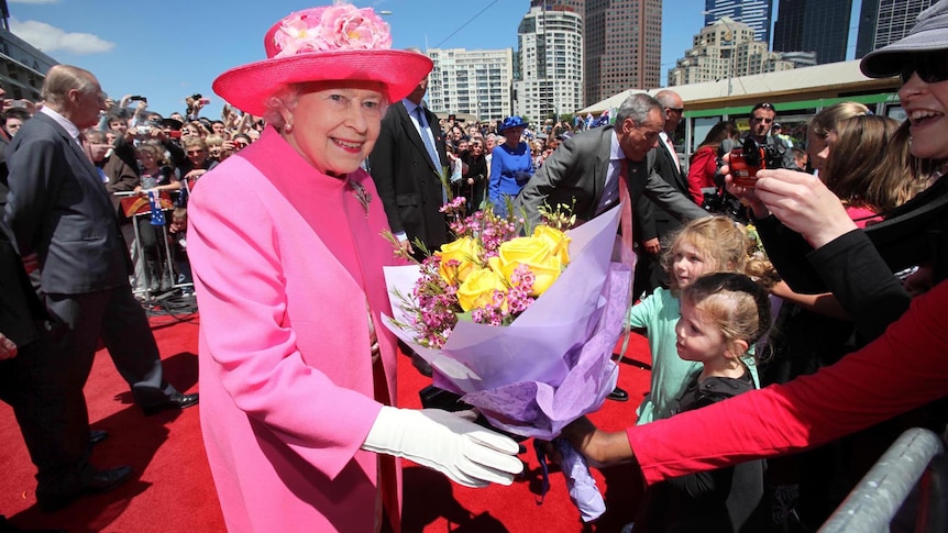 The Queen accepts flowers in Federation Square