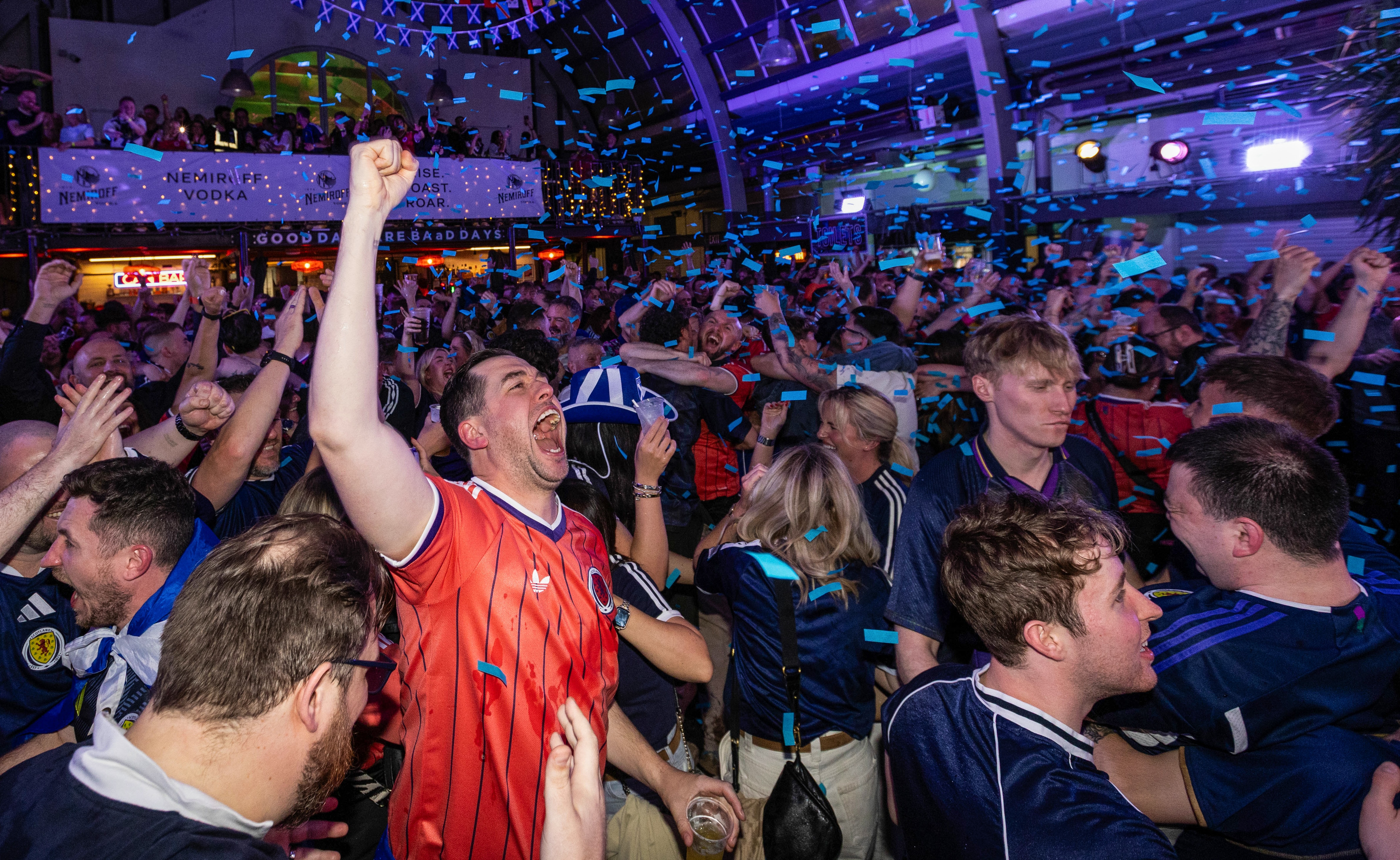 Scotland fans celebrate a goal at a World Cup live site