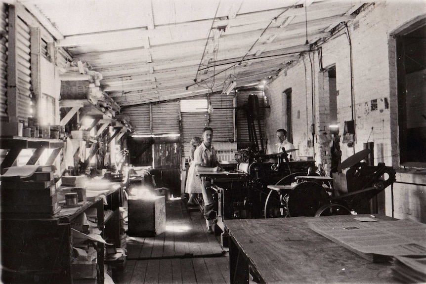 Joy MacCormack, Spike Griffiths and manager Austin 'Scot' Absolon at work in the Wagin Argus print room circa 1950.