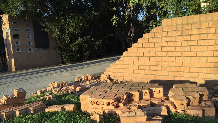 Thieves smashed through a brick fence during a robbery at a home at Albion.
