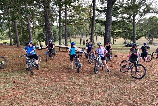 Some of the women of the Dirt Divas group mountain biking in Mackay in north Queensland