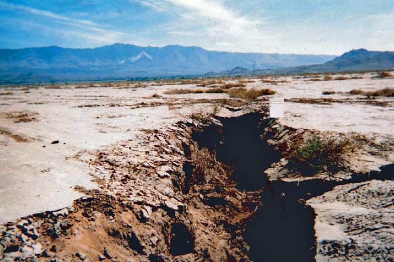A fissure due to land subsidence as a result of groundwater withdrawal in the Mojave Desert, California