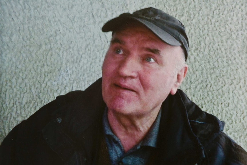 Bosnian Serb wartime general Ratko Mladic after his arrest sits wearing a cap after his arrest